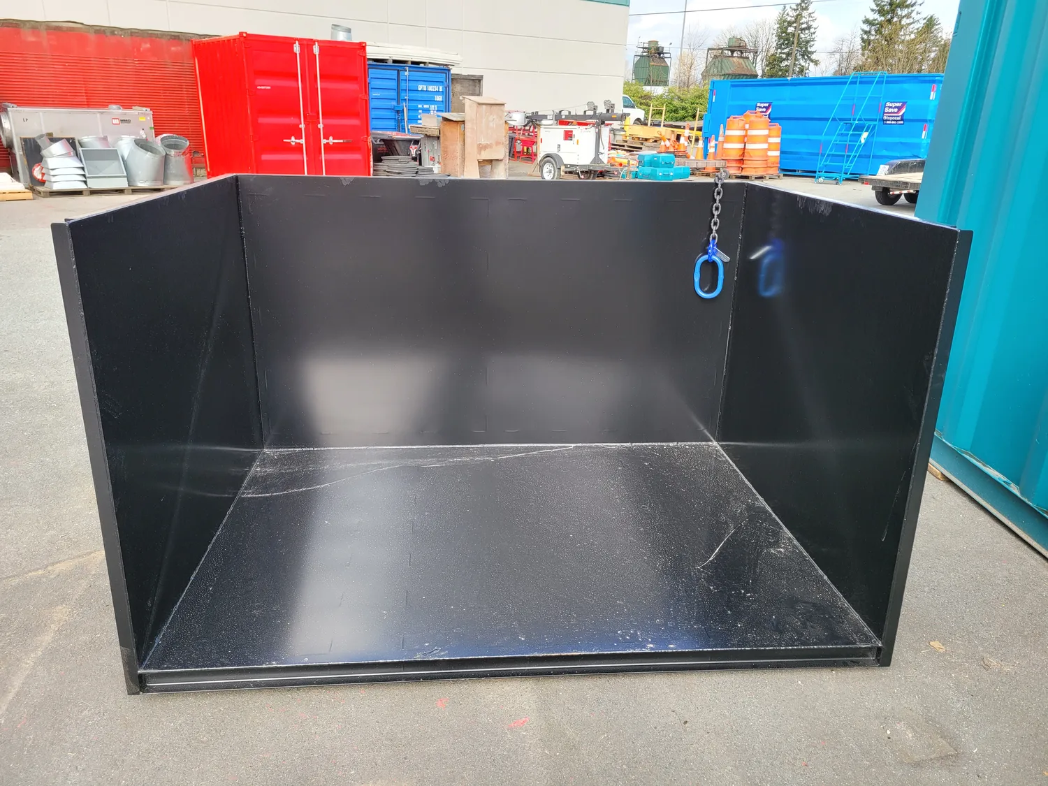 A fabricated steel self-dumping bin